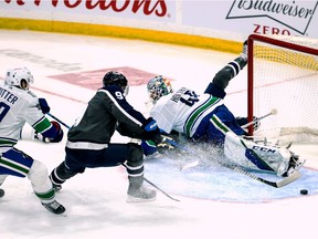 Winnipeg Jets forward Andrew Copp (9) shoots the puck against Vancouver Canucks goalie Braden Holtby (49) during the second period at Bell MTS Place.