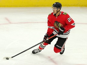 ‘My goal is to make Vancouver my home for a long time,’ says Madison Bowey, shown in action earlier this season with the Chicago Blackhawks. ‘I can’t say it’s my last (career) shot, but I’m treating it like that.’