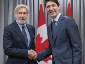 Prime Minister Justin Prime Minister Justin Trudeau meets with actor Harrison Ford, vice-chair of the Conservation International Board of Directors, at the Nature Champions Summit in Montreal on April 25, 2019.