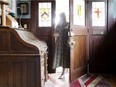 Nikki Renshaw in the foyer of her 3,300-square-foot, circa 1913 Kitsilano Craftsman home.