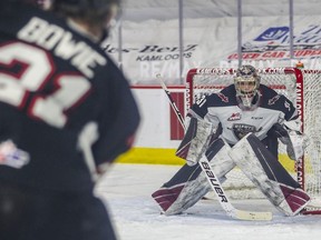 Ethan Browne of the Prince George Cougars looks to shoot on Vancouver Giants netminder Trent Miner as the Giants had their winning streak snapped in a 6-3 loss on Saturday, April 10 to the Cougars.