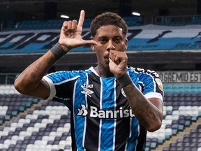 Brazil's Gremio Jean Pyerre celebrates after scoring against Ecuador's Independiente del Valle during the Copa Libertadores tournament qualifying-round match at Gremio Arena in Porto Alegre, Brazil, last week. The Brazilian playmaker has been linked to the Vancouver Whitecaps.