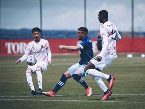 Vancouver Whitecaps striker Lucas Cavallini scores his first pre-season goal in a 3-0 win over the Real Monarchs in Sandy, Utah, on Tuesday.