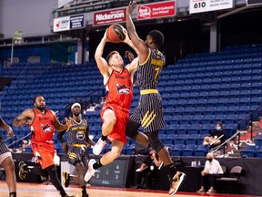 Fraser Valley Bandits guard Marek Klassen takes it to the hole against Hamilton Honey Badgers guard Jaylen Babb-Harrison during a CEBL game last year. Klassen re-signed with the Bandits on Tuesday.