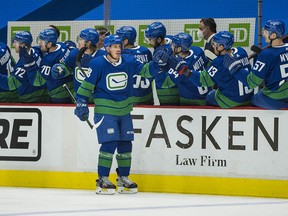 Vancouver Canucks defenceman Nate Schmidt celebrates his goal against the Ottawa Senators in the first period at Rogers Arena.