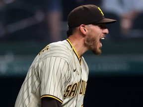 Padres starter Joe Musgrove reacts after pitching a no-hitter against the Rangers at Globe Life Field in Arlington, Texas, Friday, April 9, 2021. This is the first no-hitter in franchise history for the Padres.