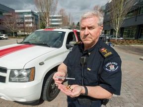 Paramedic specialist Brian Twaites with naloxone, which he injects into people who are overdosing.