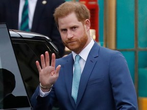 In this file photo taken March 9, 2020, Prince Harry leaves after attending the annual Commonwealth Service at Westminster Abbey in London.