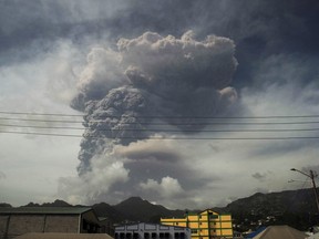 Ash and smoke billow as the La Soufriere volcano erupts in Kingstown on the eastern Caribbean island of St. Vincent, April 9, 2021.