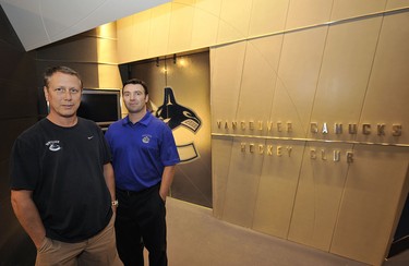 Equipment manager Pat O'Neill (keft) and medical trainer Mike Burnstein helped design the Vancouver Canucks' new dressing room at then-GM Place in September 2009.