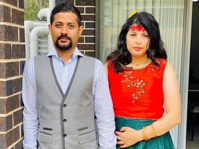 Bisnhu Aryal and his wife.