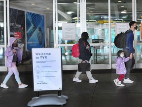 Scenes from the International arrivals level at Vancouver International Airport (YVR) as a mandatory three day quarantine takes effect, in Richmond, BC., on February 22, 2021.