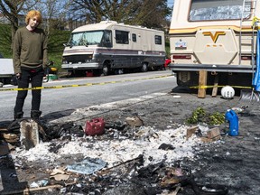 Chloe Spurrell-West surveys what was left after the van she and her friend Ross lived in burned. She suffered second- and third-degree burns, but Ross did not survive the fire. Spurrell-West said she would sift through the ashes to see what she could recover before cleaning up the rest of the debris.