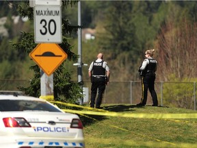 RCMP and the Integrated Homicide Investigation Team (IHIT) on the scene of a fatal shooting in Coquitlam’s Town Centre Park on April 20, 2021.