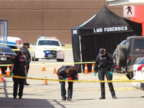 RCMP and the Integrated Homicide Investigation Team on the scene of a fatal shooting at the Langley Sportsplex on April 21, 2021.