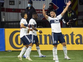 Marquee Whitecaps forward Lucas Cavallini (right, celebrating a goal he scored last season) will have his every on-field move for the Caps dissected this season on AM 730, as part of the MLS club’s new deal to have their games broadcast by Corus Entertainment.