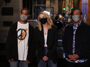 From left, musical guest Kid Cudi, host Carey Mulligan and cast member Kenan Thompson appear in a promotional image for "Saturday Night Live."