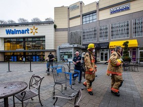 Saanich police are investigating after a vehicle drove through a wall in the parking garage at Uptown Walmart on Friday.