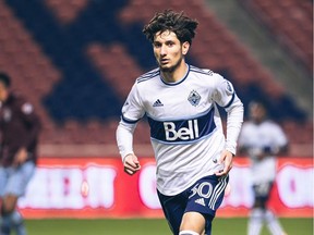 Kamron Habibullah runs down the pitch at Rio Tinto Stadium with the Vancouver Whitecaps during his pro debut against the Colorado Rapids on May 2.