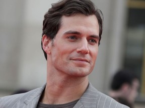 British actor Henry Cavill poses on the red carpet as he arrives to attend the world premiere of his new film Mission: Impossible Fallout, on July 12, 2018 at the Theatre de Chaillot in Paris.