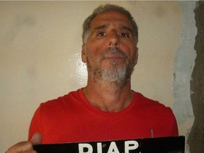 (FILES) Handout file photo taken on September 05, 2017 released by the Uruguayan Interior Ministry on June 24, 2019, showing Italian Rocco Morabito, wanted for more than 20 years for drug trafficking and mafia activities, during his arrest in Montevideo. - Morabito, who escaped a prison in Uruguay on June, 2019, was captured on May 24, 2021 in Joao Pessoa, northeastern Brazil, the Federal Police (PF) informed.