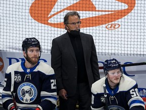 Columbus Blue Jackets head coach John Tortorella stands in the bench in the game against the Detroit Red Wings in the third period at Nationwide Arena.