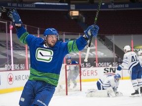 J.T. Miller celebrates a goal against the Toronto Maple Leafs at Rogers Arena on March 6.