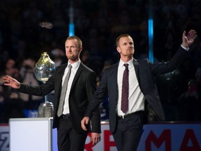 Henrik (left) and Daniel Sedin are moving into more on-ice teaching and counselling of young players and prospects in the Canucks organization, both in Vancouver and at AHL Abbotsford.