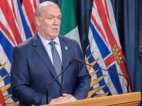 Premier John Horgan has promised to implement a made-in-B.C. sick leave program to “fill in the gaps” left by the federal government.