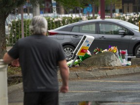Retired Vancouver Police officer Brad Stephen at the scene of a shooting which killed a corrections officer on Saturday.