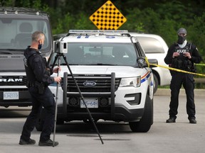 RCMP on scene after a woman was fatally shot in the 9700-block of 161 A Street in Surrey on Tuesday night in Surrey.