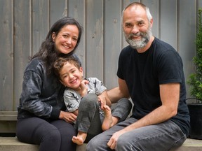 Five-year-old Forester with mom, Claudia Ho Lem, and dad, Ben Perrin outside their Vancouver home. Forester has Fragile X syndrome which means he will need one-on-one support the rest of his life.