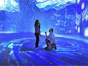 She said ‘yes’: Don Iverson proposes to Chandra Pope at the Van Gogh Exhibition at Vancouver Convention Centre West.