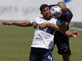 Whitecaps striker Lucas Cavallini (left, vying for the ball with CF Montreal’s Aljaz Struna during a Major League Soccer game last season in Sandy, Utah) suffered through ‘one of the most disappointing years of my career’ in 2021.