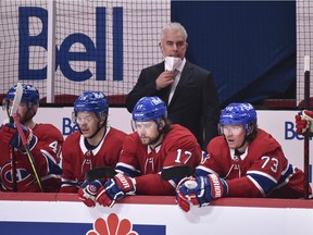 Head Coach Dominique Ducharme of the Montreal Canadiens looks on from behind the bench against the Winnipeg Jets during the second period in Game Four of the Second Round of the 2021 Stanley Cup Playoffs at the Bell Centre on June 7, 2021 in Montreal, Canada.