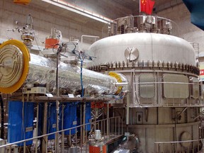 The Experimental Advanced Superconducting Tokamak fusion device, nicknamed 'artificial sun', is tested at the Institute of Plasma Physics under the Chinese Academy of Sciences in Hefei, capital city of east China's Anhui Province on September 28, 2006.
