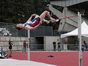 Mike Mason, of Nanoose Bay, B.C., competes in the high jump event at the Harry Jerome International Track Classic, in Burnaby, B.C., on Saturday, June 12, 2021. Mason won the competition with a jump of 2.3 metres.