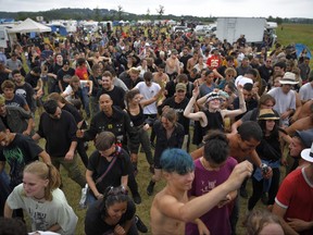 Participants take part in an illegal rave party in a field in Redon, northwestern France, on June 19, 2021.