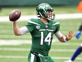 Quarterback Sam Darnold #14 of the New York Jets passes the ball in the first quarter of the game against the Buffalo Bills at MetLife Stadium on October 25, 2020 in East Rutherford, New Jersey.