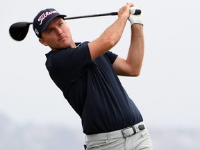 Russell Henley plays his shot from the fourth tee during the second round of the U.S. Open golf tournament at Torrey Pines Golf Course on June 18, 2021.