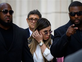 In this file photo Emma Coronel Aispuro, wife of Joaquin "El Chapo" Guzman walks out of Brooklyn Federal Court on July 17, 2019.