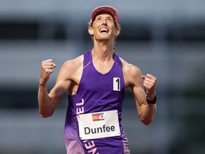 Evan Dunfee, of Richmond celebrates after finishing the 10,000 metre race walk event in a time of 38:39.72, setting a new Canadian record, during the Harry Jerome International Track Classic, in Burnaby on Saturday, June 12, 2021.