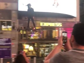 Mystery man hovers through Times Square