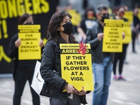 More than a hundred people stage a protest at the Vancouver Art Gallery on Saturday commemorating the second anniversary of the start of resistance protests in Hong Kong.