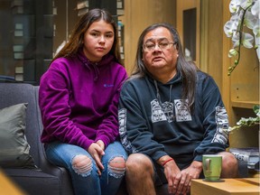 Maxwell Johnson and his granddaughter Tori in Vancouver on Jan. 20, 2020. Johnson has filed a complaint with the B.C. Human Rights Tribunal after he and Tori were handcuffed by police outside a Vancouver bank in 2019 while trying to open a bank account.