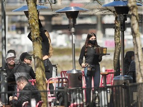 Patio patrons during COVID-19 restrictions in Vancouver, BC., on April 11, 2021.