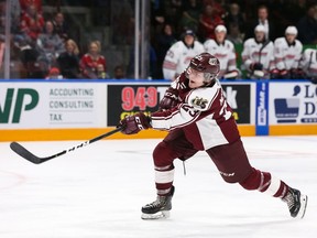 ‘I love to compete against anybody and I don’t really back down from anyone,’ says Mason McTavish, shown in action for the OHL’s Peterborough Petes in the 2019-20 season, when he put up 42 points in 57 games.