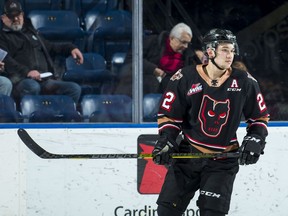 Vancouver Canucks defence prospect Jett Woo’s play stalled in his final season of junior hockey with the Calgary Hitmen (above), but he bounced back with a solid first professional season last winter with the AHL’s Utica Comets.