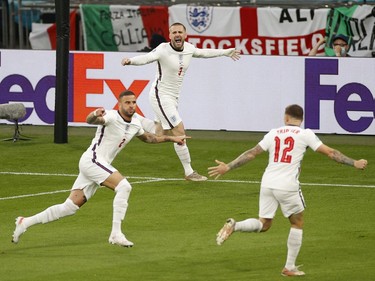 Luke Shaw of England celebrates after scoring their side's first goal during the UEFA Euro 2020 Championship Final between Italy and England at Wembley Stadium on July 11, 2021 in London, England.