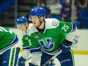 Utica Comets defenceman and Vancouver Canucks prospect Brogan Rafferty in AHL action in 2019.
